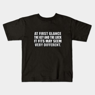 At first glance, the key and the lock it fits may seem very different Kids T-Shirt